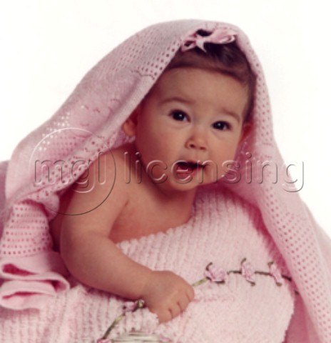 Baby Girl Under Pink Blanketjpg