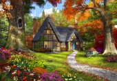 A small cosy cottage in a Autumnal woodland.